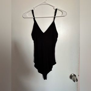 Forever 21 size small body suit. Form fitting. Black.
